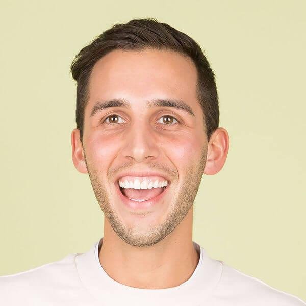 Portrait of male customer giving Excellent Plan testimonial.