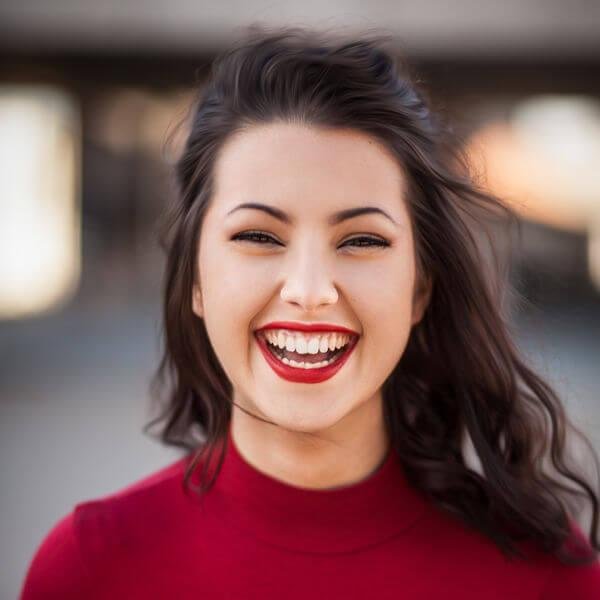 Portrait of female customer giving Work easy on my house testimonial.